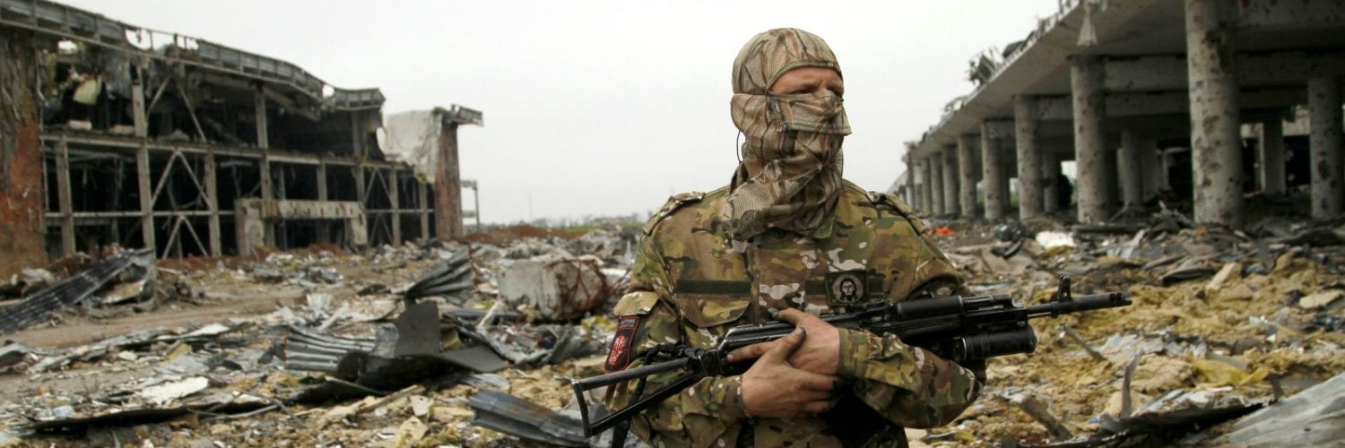 Separatist-at-Donetsk-airport-Reuters